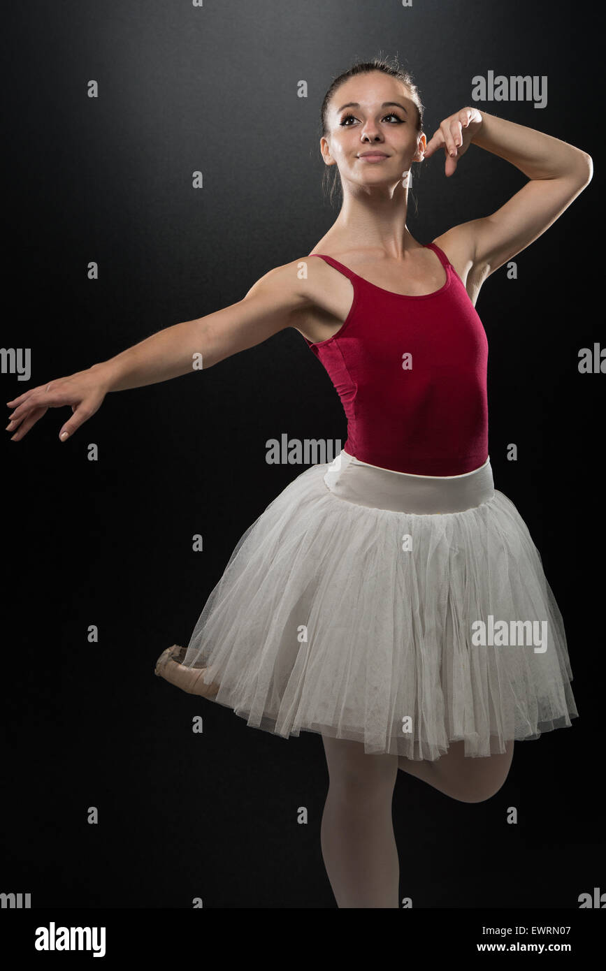 Joven Mujer De Tutu Blanco Haciendo Ballet Sobre Fondo Gris Foto de archivo  - Imagen de deporte, manera: 191862304