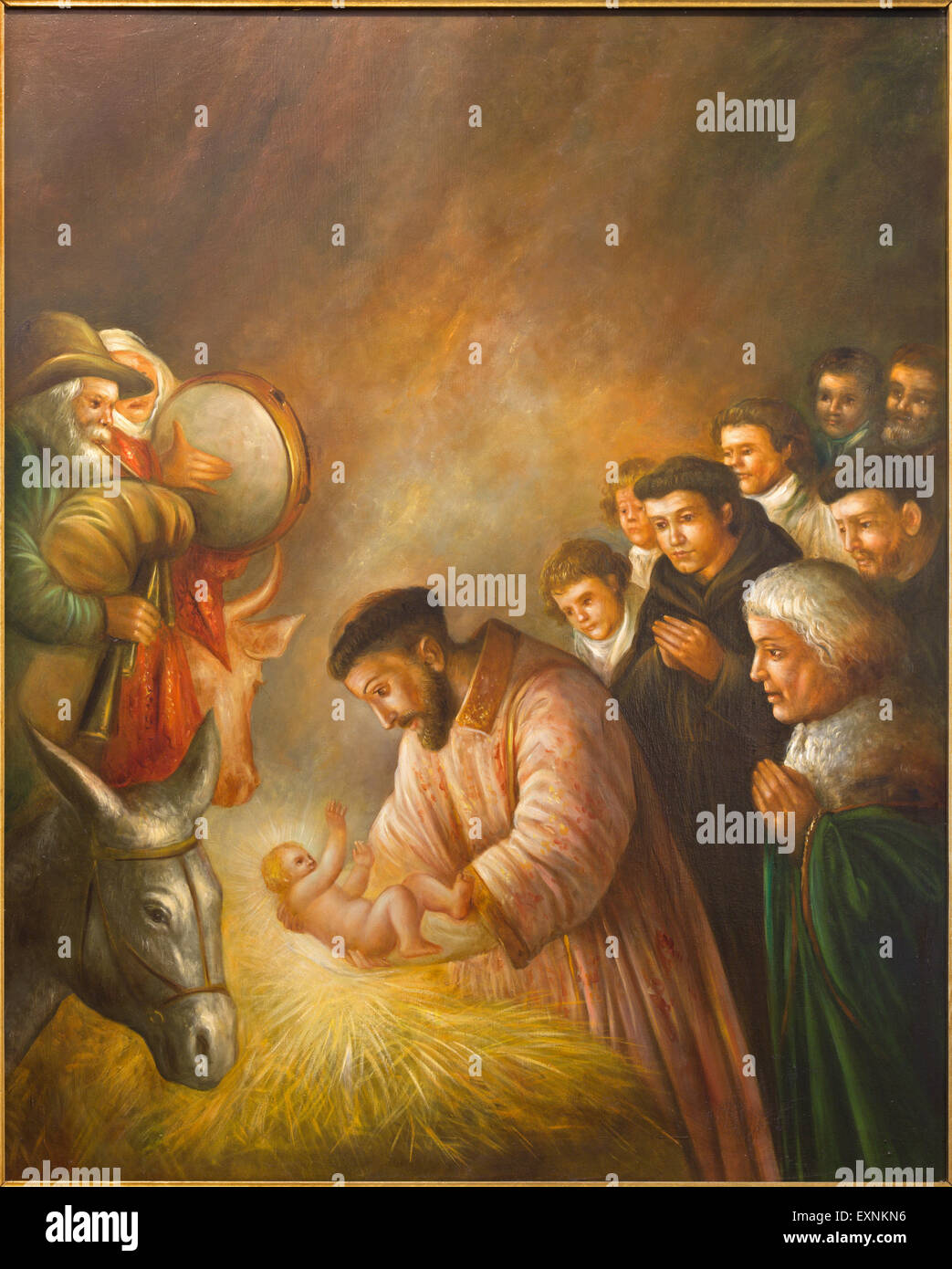 CORDOBA, España - 27 de mayo de 2015: la pintura moderna de st. Francisco de Asís en la escena de la Natividad por artista desconocido de 20.%. Foto de stock