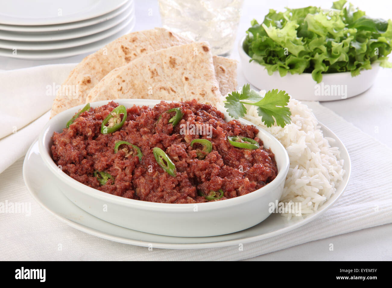 CORNED Cordero cocer al horno con arroz y el chapati Foto de stock