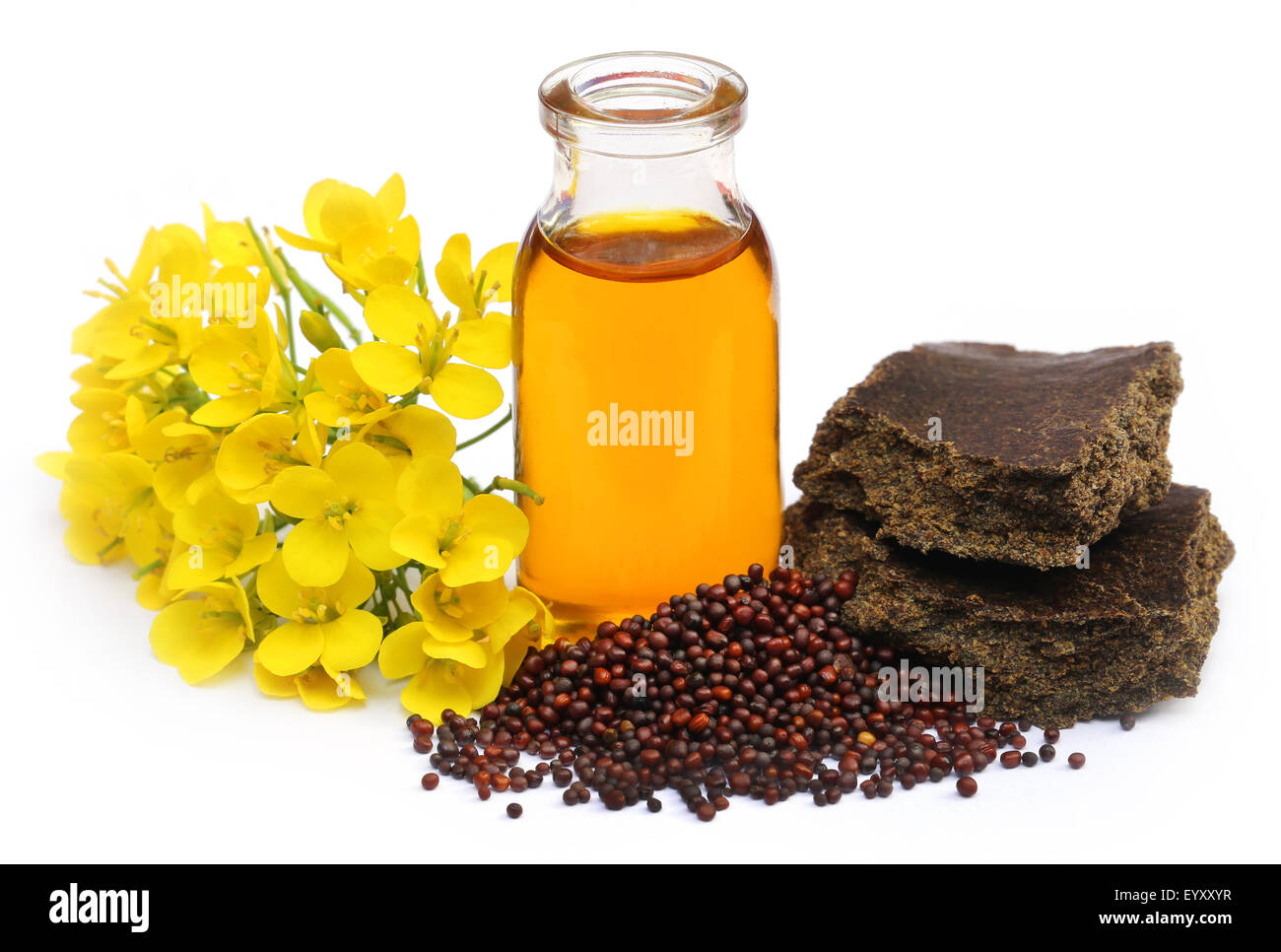 El aceite de mostaza pastel con flor Fotografía de stock - Alamy