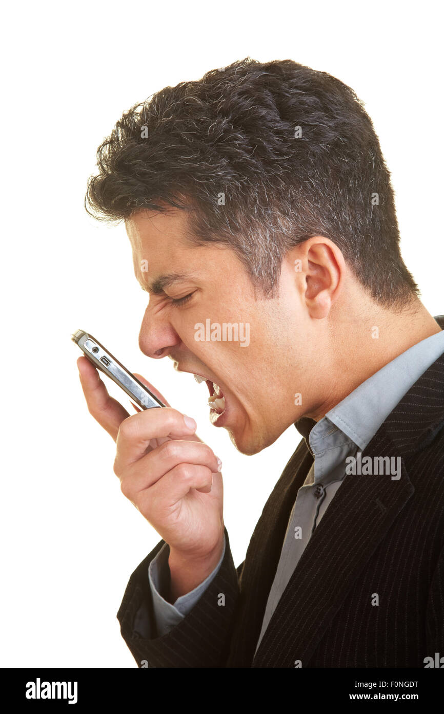Empresario gritando en su teléfono celular Foto de stock