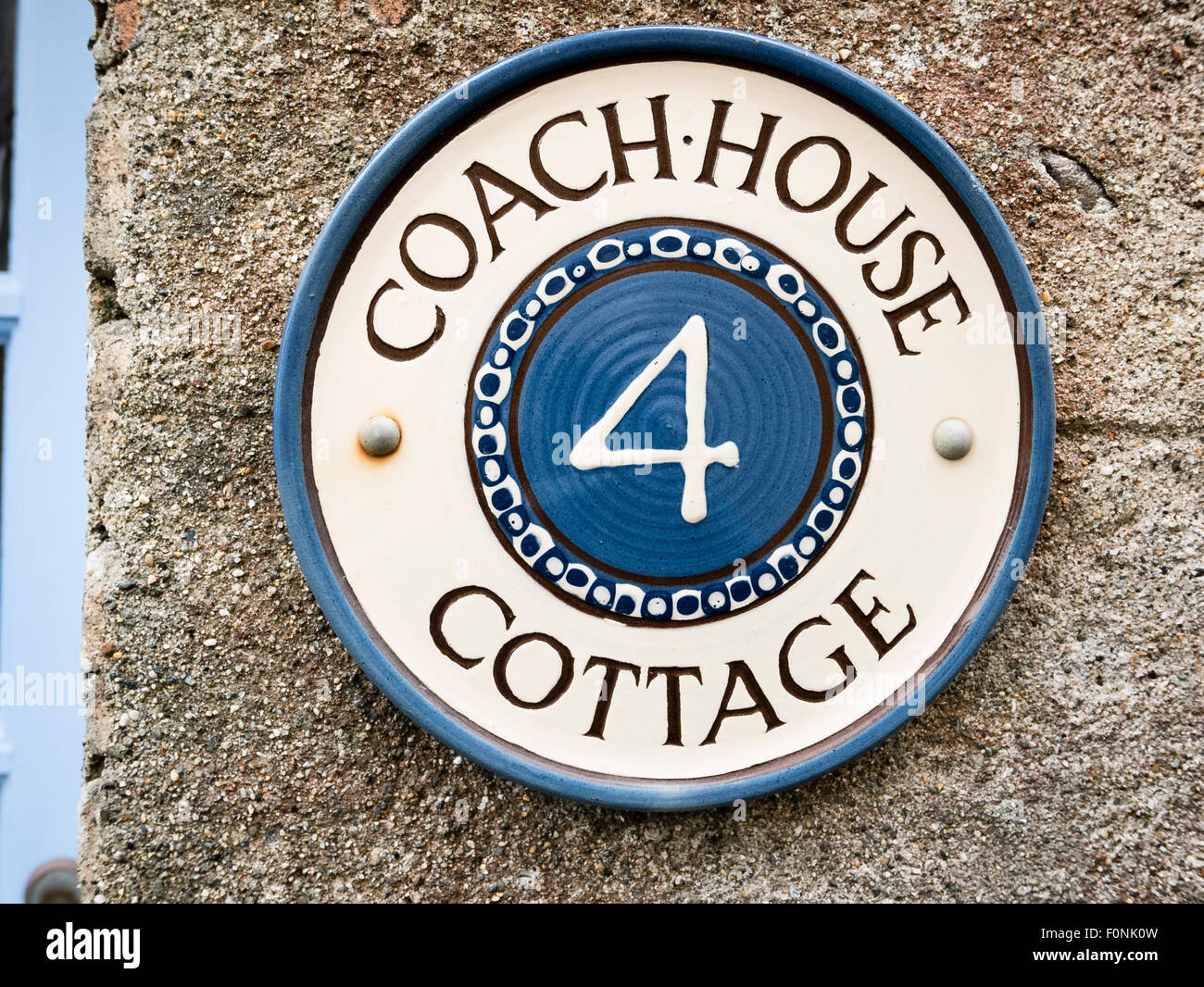 Casa placa de nombre Coach House; Foto de stock