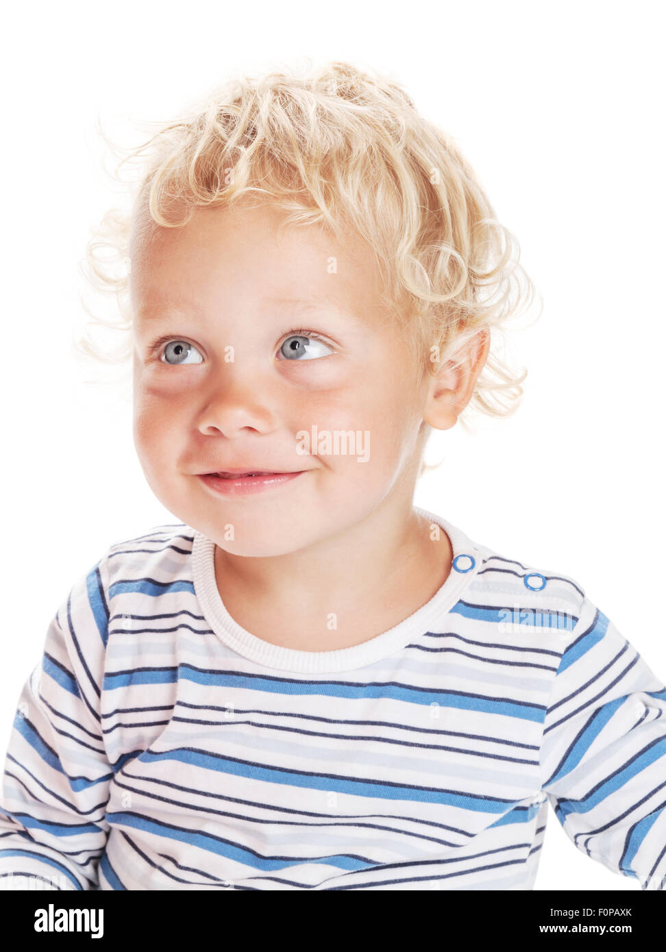 Retrato De Un Bebé Lindo Del Pelo Rizado Que Mira Lejos Foto de archivo -  Imagen de sonriente, curioso: 86696328