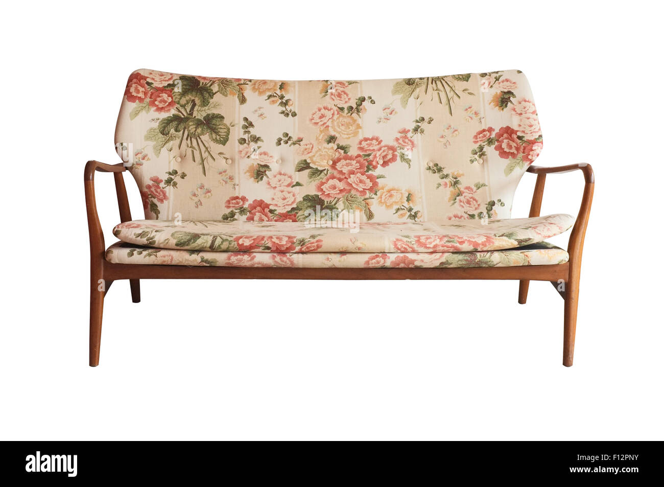 Sofá de madera tapizados en tela floral impreso, vintage style Foto de stock