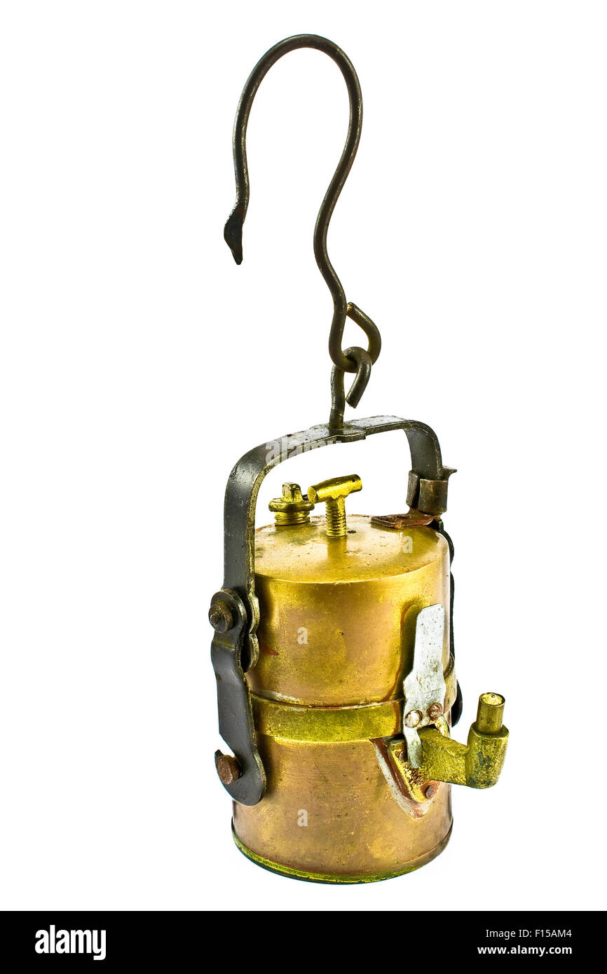 Lámpara de carburo de antiguos mineros aislado en blanco Fotografía de  stock - Alamy