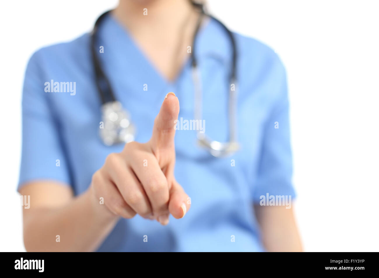 Enfermera o médico seleccionar algo en blanco con el dedo a la cámara aislado sobre un fondo blanco. Foto de stock
