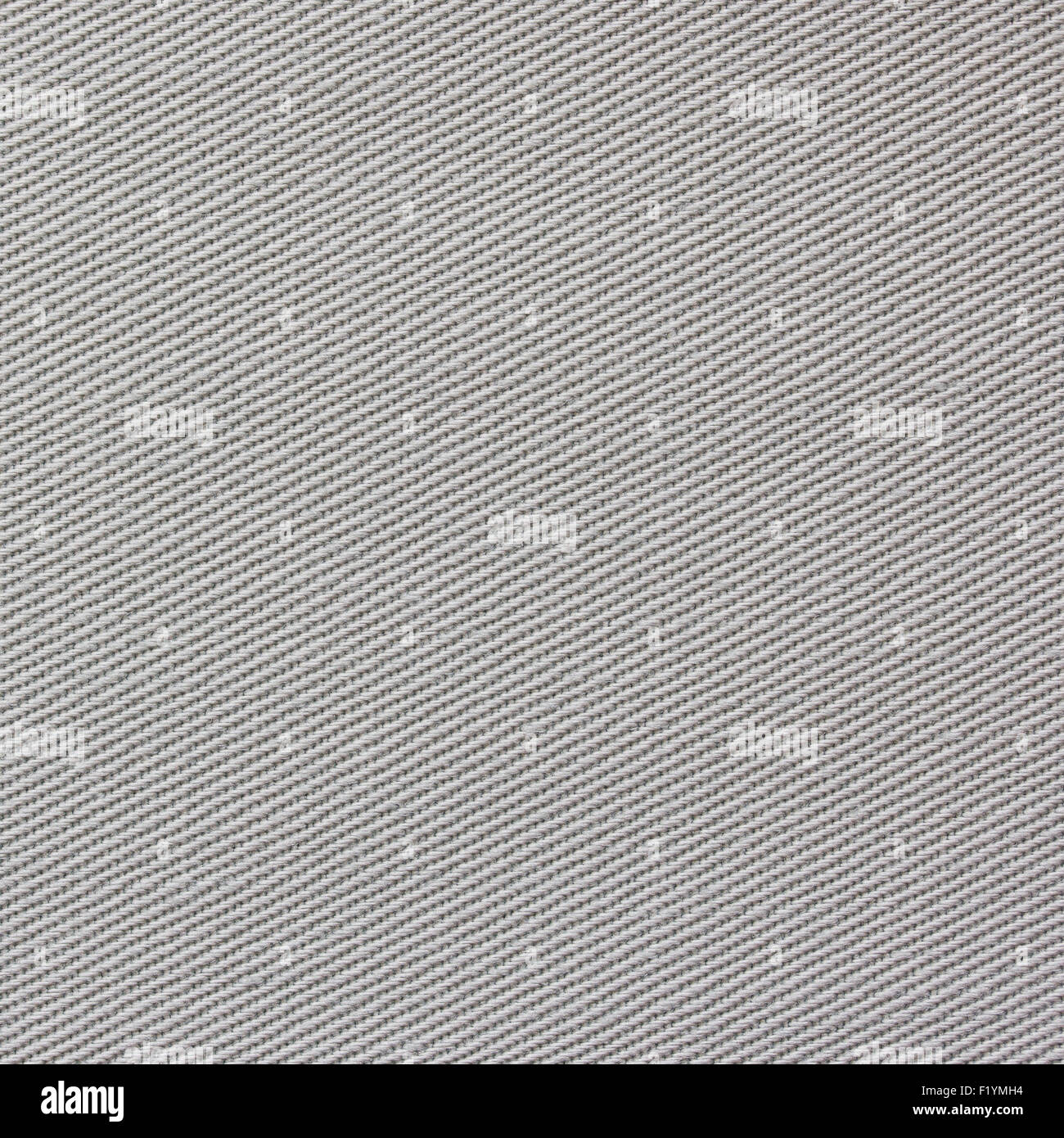 La textura de la alfombra gris. el fondo de tela gris. vista