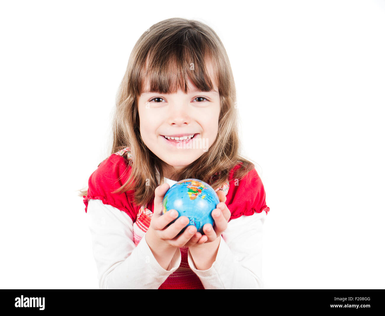 Mädchen hält kleine Weltkugel en ihren Händen Foto de stock