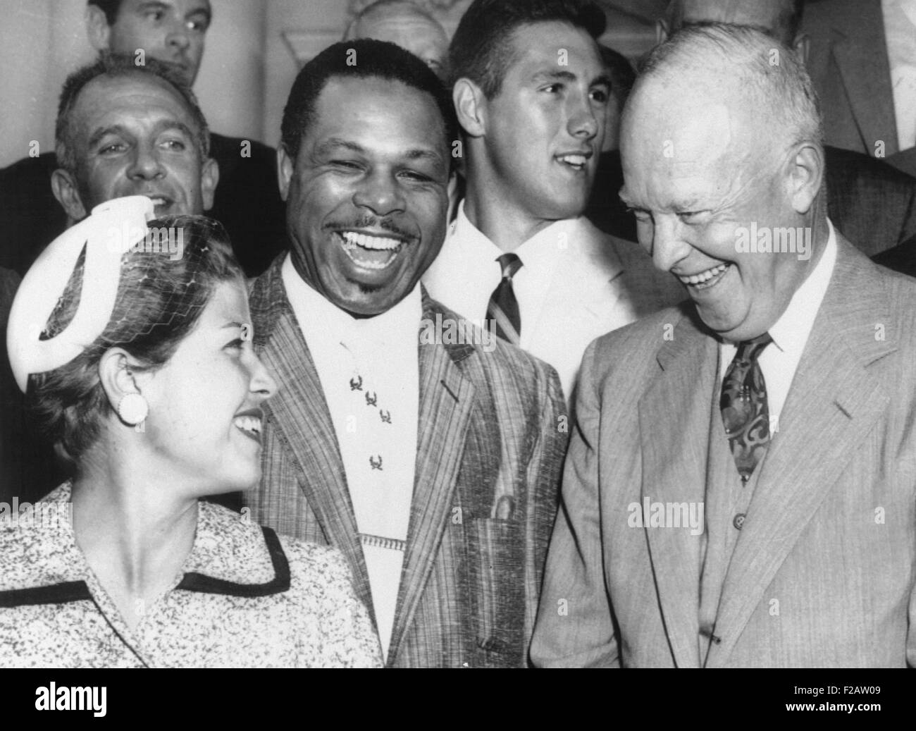 El presidente Eisenhower se ríe con campeón golfista Romack Barbara Boxer y Archie Moore. El 12 de julio de 1955. La Casa Blanca organizó un Foto de stock
