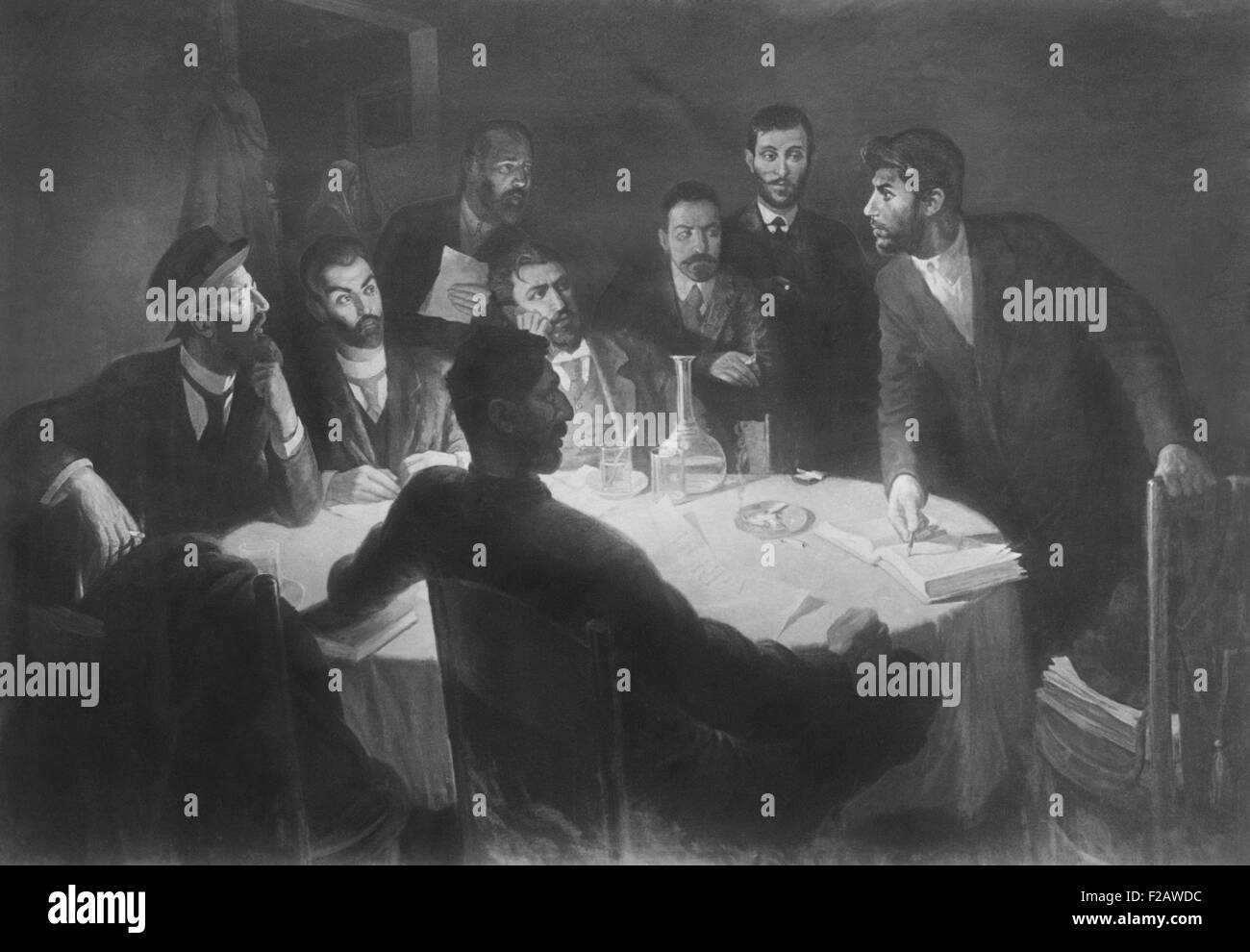 Josef Stalin dirigiendo una reunión con sus compañeros en el movimiento revolucionario. Reproducción de una pintura del artista I.Z. Vepkhvadze. Ca. 1900. (CSU 2015 11 1387) Foto de stock