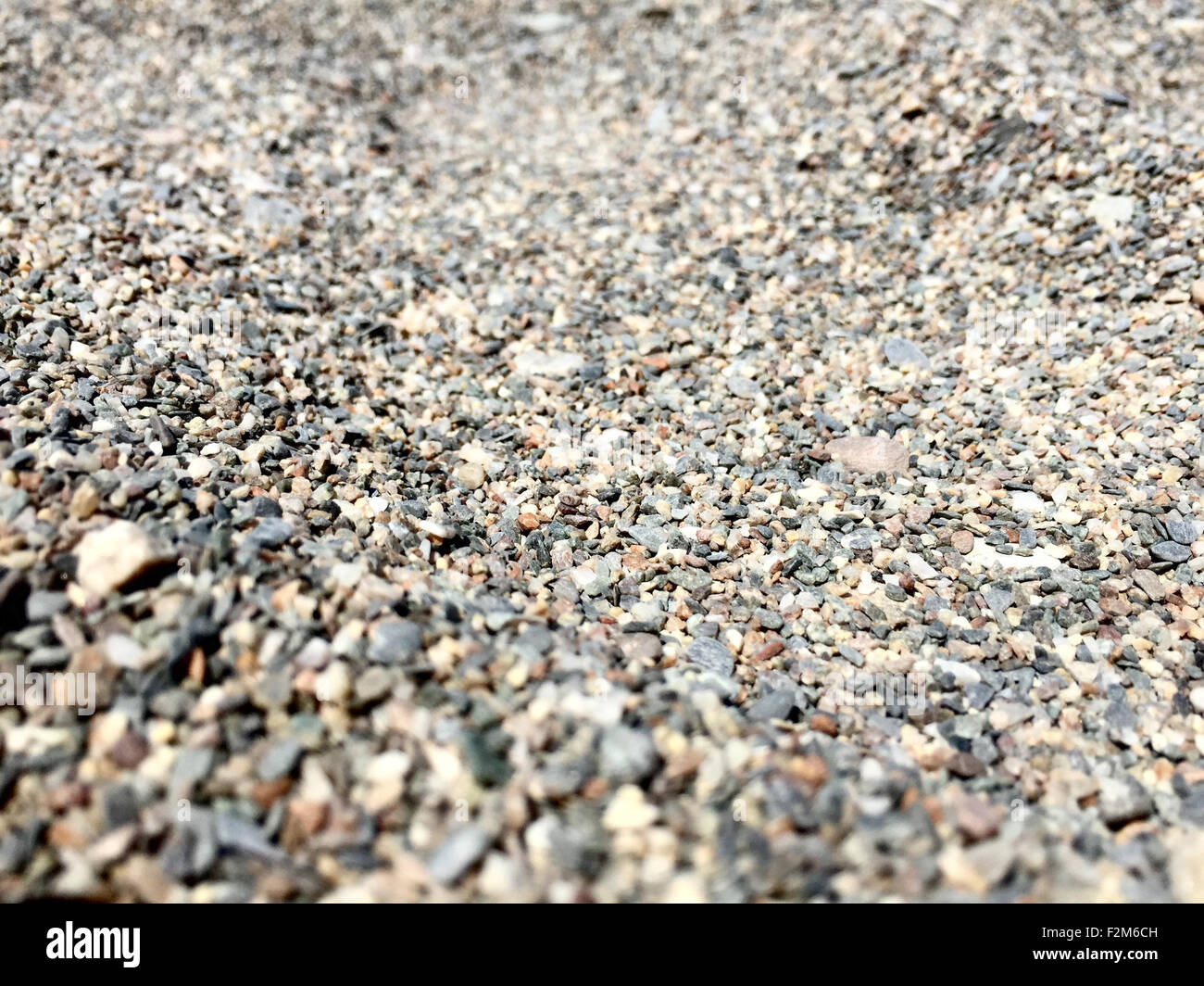 Poco piedras de una playa italiana Foto de stock