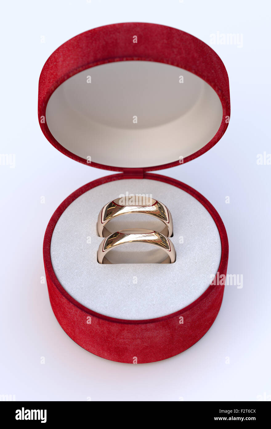 Pareja de lujo de oro anillos de boda en el recuadro sobre fondo blanco  Fotografía de stock - Alamy