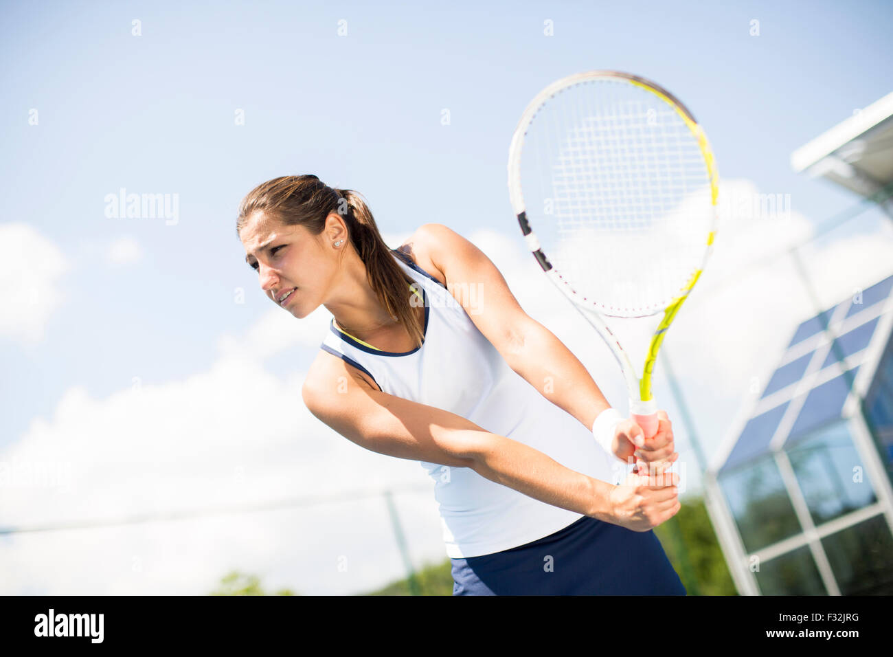 Chica jugando tenis Foto de stock