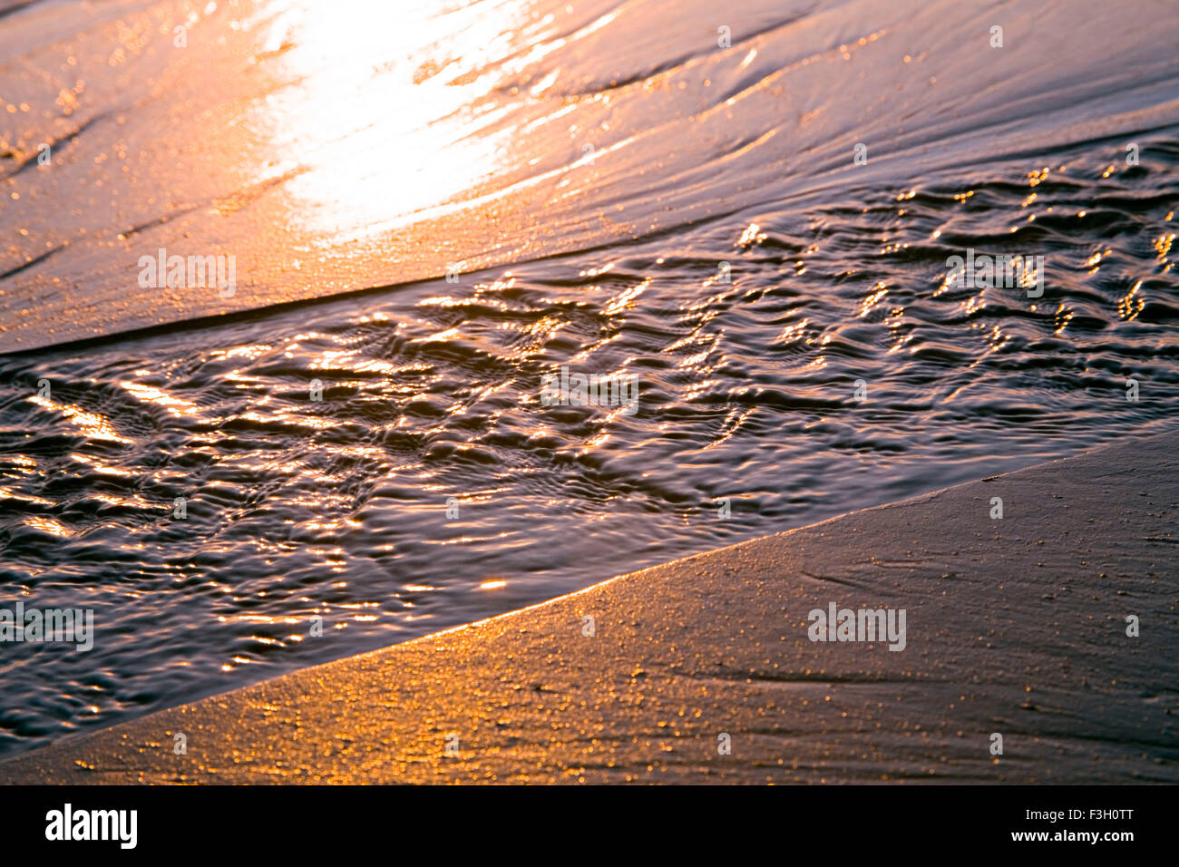Agua corriente mar atardecer fotografía artística ; Aksa Malad beach ; ; ; ; Maharashtra Bombay Bombay India Foto de stock