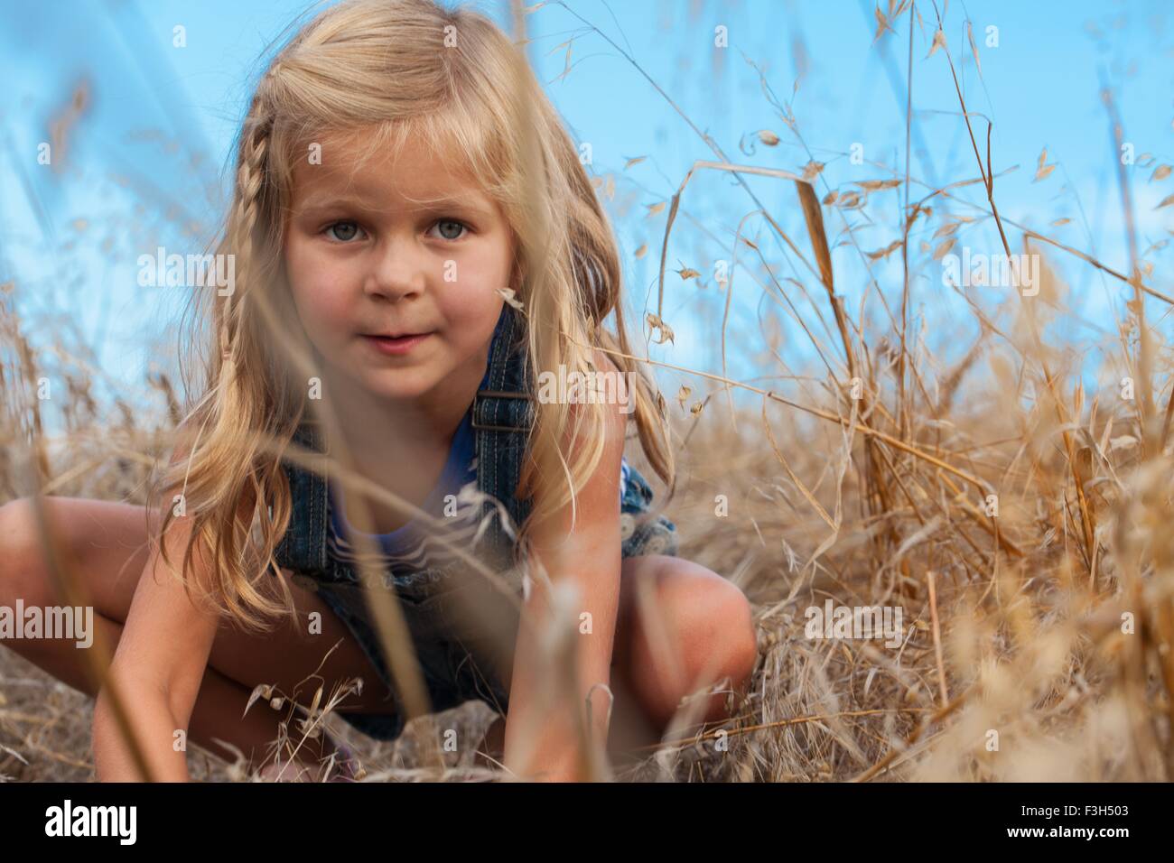 Chica En Cuclillas Fotos e Imágenes de stock - Alamy
