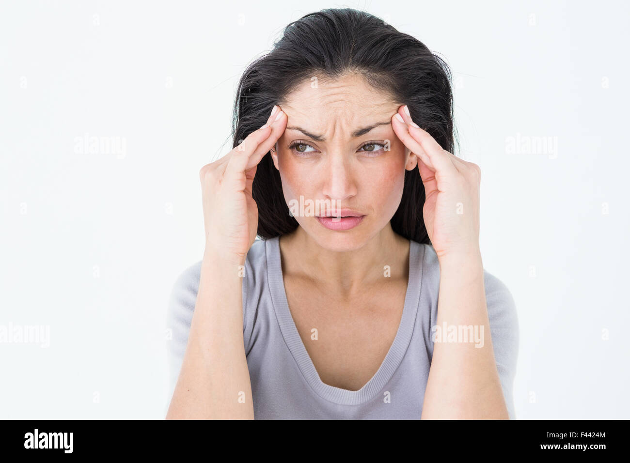 Una morena que sufren migraña Foto de stock
