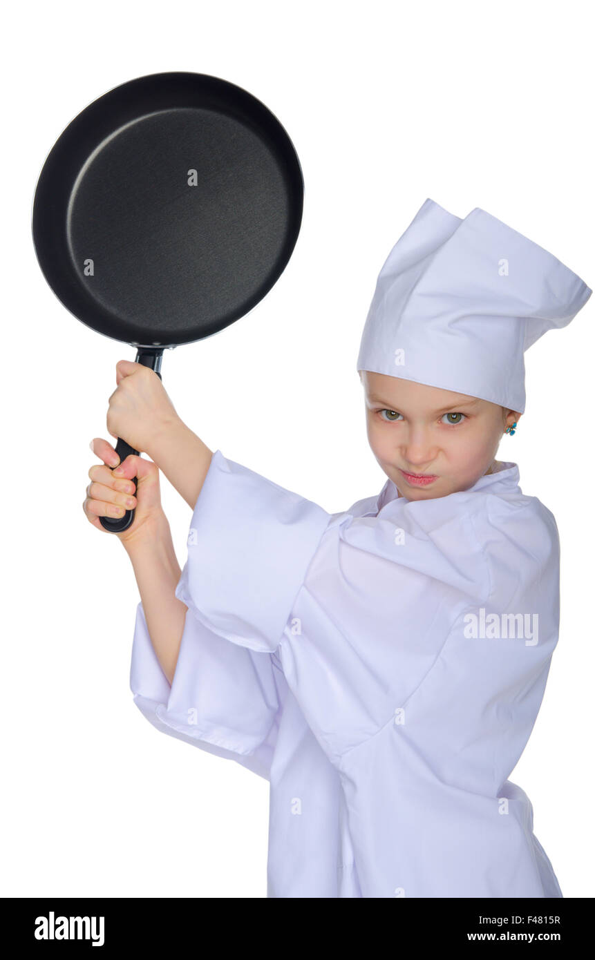 El joven chef amenaza sartén Foto de stock