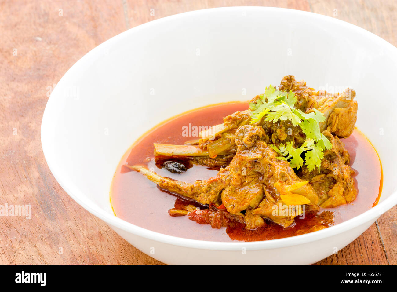 Cordero rogan josh, costillas de cordero, curry, cocina india Foto de stock