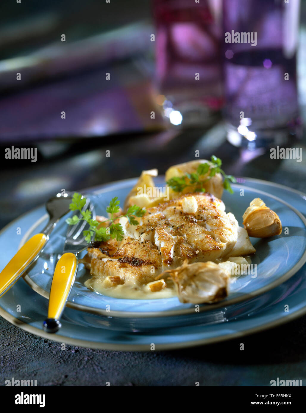 Bacalao con sal y cerveza blanca Maroilles Foto de stock