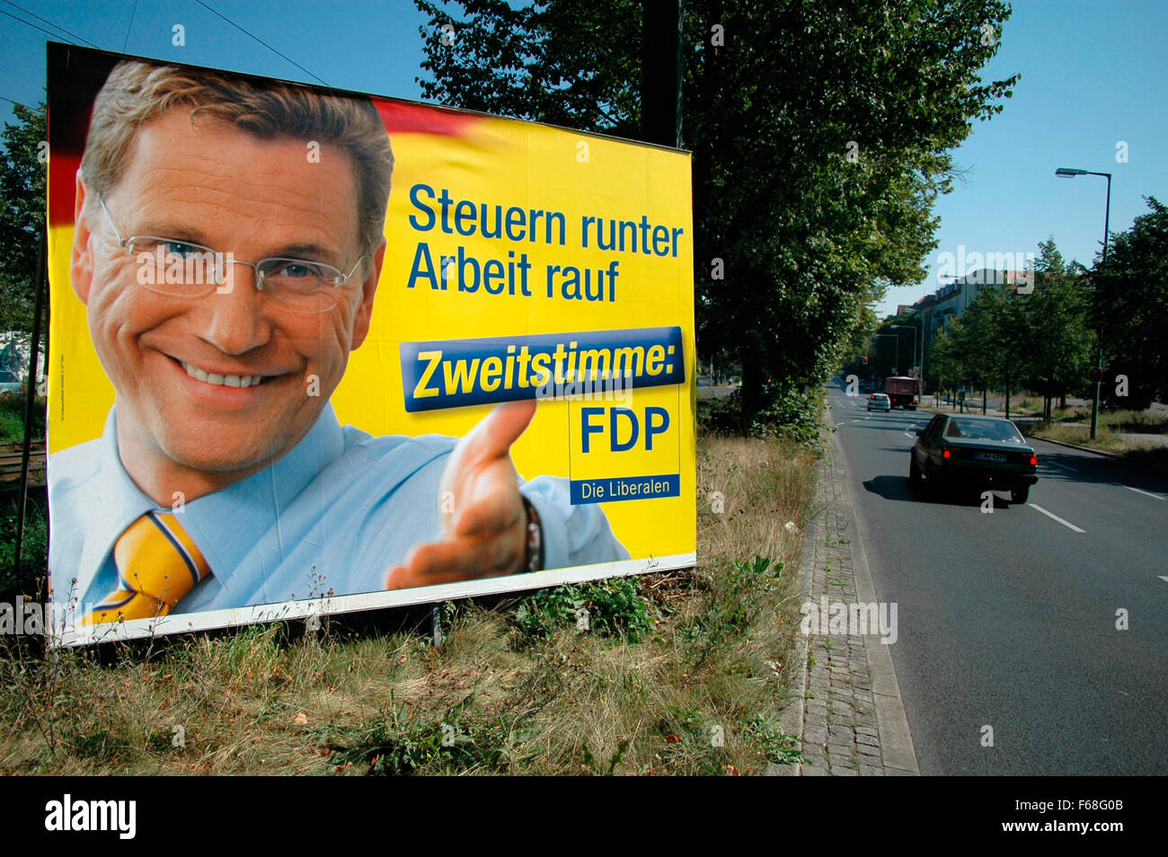 Guido Westerwelle, FDP - Wahlplakat, Wahlkampf zum Bundestag 2005, Bornholmer Strasse, Berlin-Premzlauer Berg:. Foto de stock