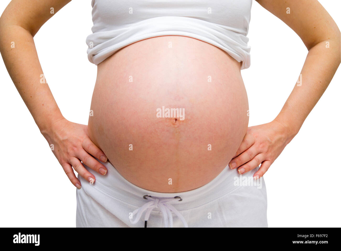 Las mujeres embarazadas en el salón blanco sobre blanco aislado de desgaste Foto de stock