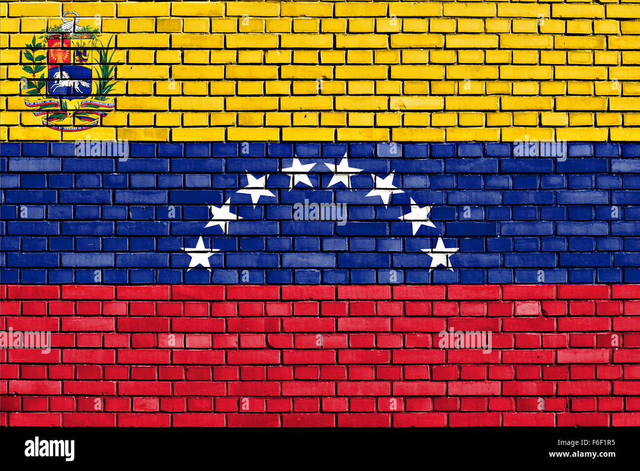 Bandera de Venezuela estado pintado sobre la pared de ladrillo Foto de stock