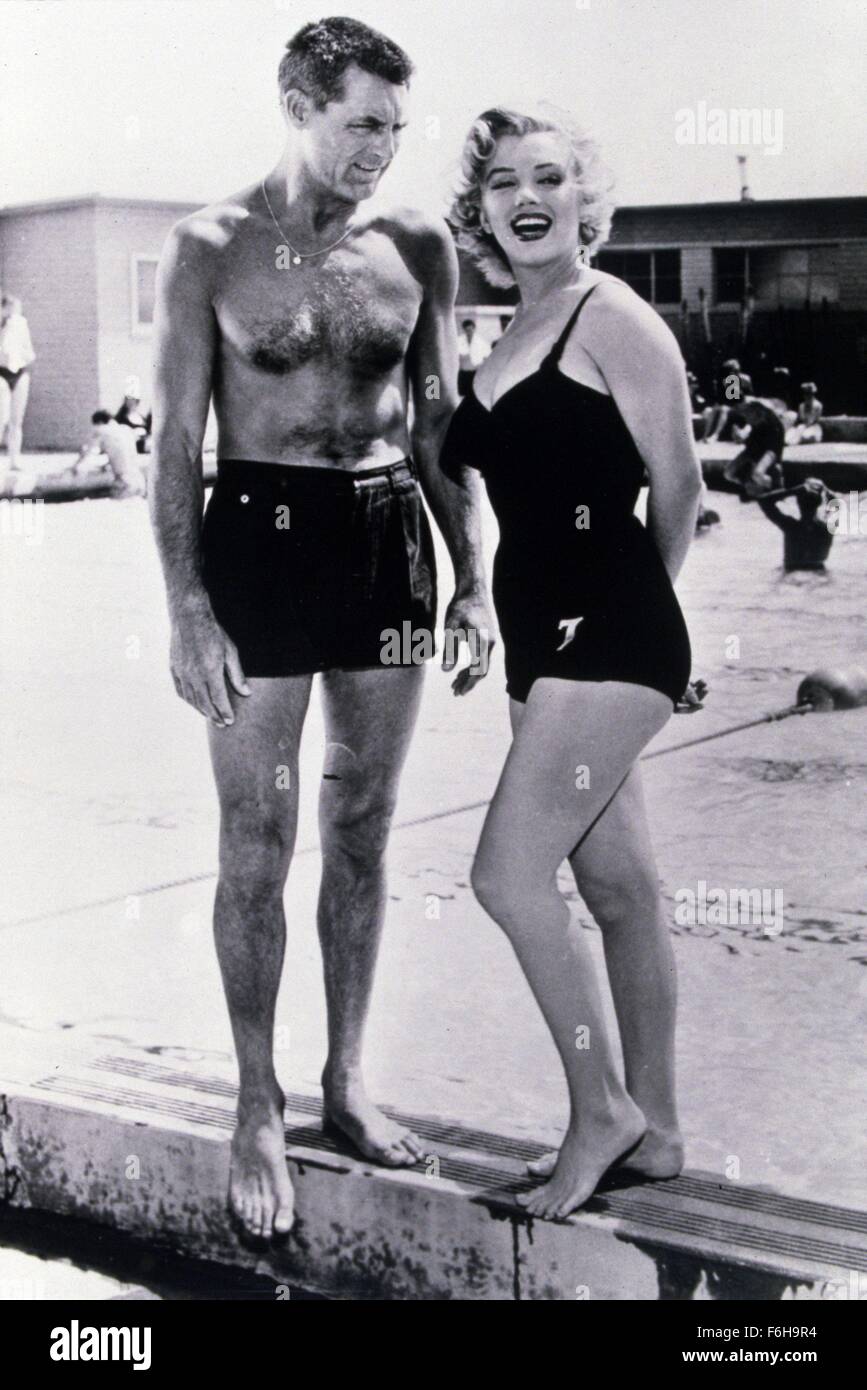 En 1952, el título de la película: MONKEY BUSINESS, Director: Howard Hawks,  Estudio: Fox, Foto: pecho desnudo, traje de baño, bañador, parte del cuerpo  vestido, Cary Grant, PISCINA, Marilyn Monroe, traje de