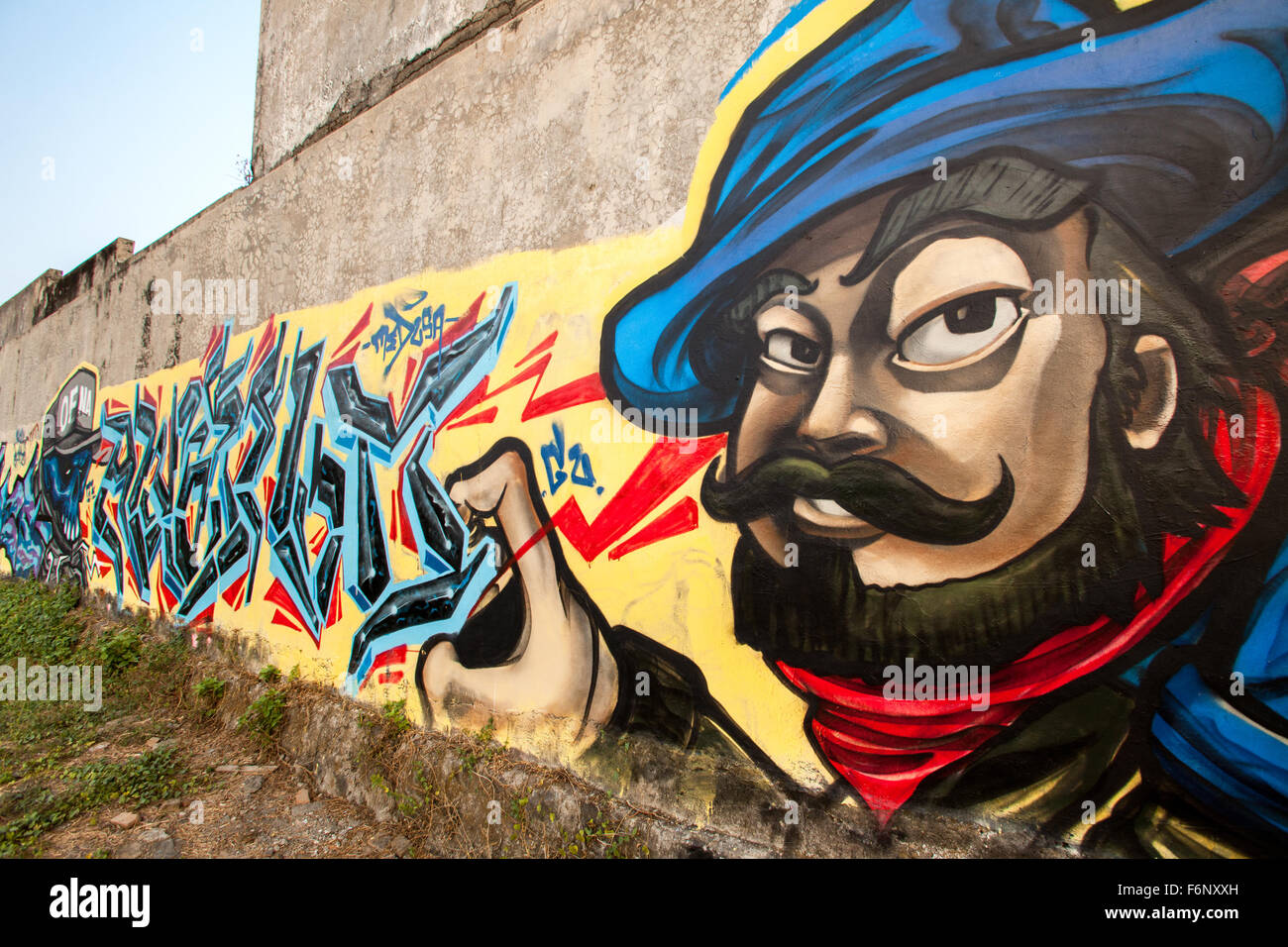 Bigote hombre graffiti en una pared en Java, Indonesia Fotografía de stock  - Alamy