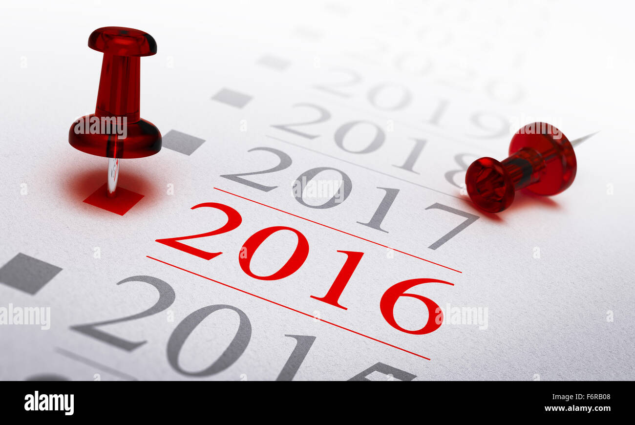 Año 2016 escrito en un papel con una chincheta roja, concepto imagen para visión de negocio o Nuevo año dos mil dieciséis. Foto de stock