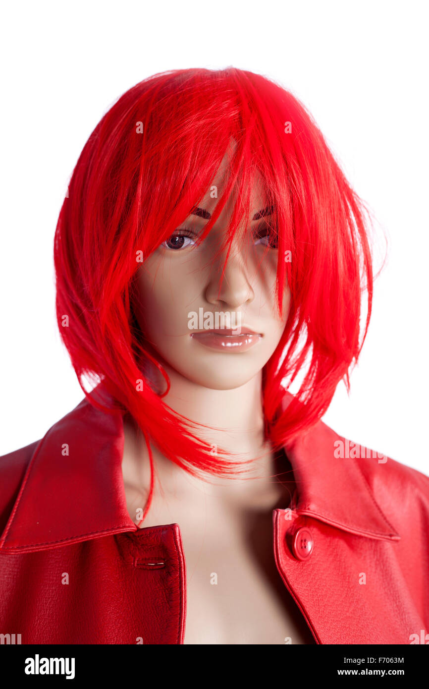 Maniquí realista con peluca roja y una chaqueta. Foto de stock