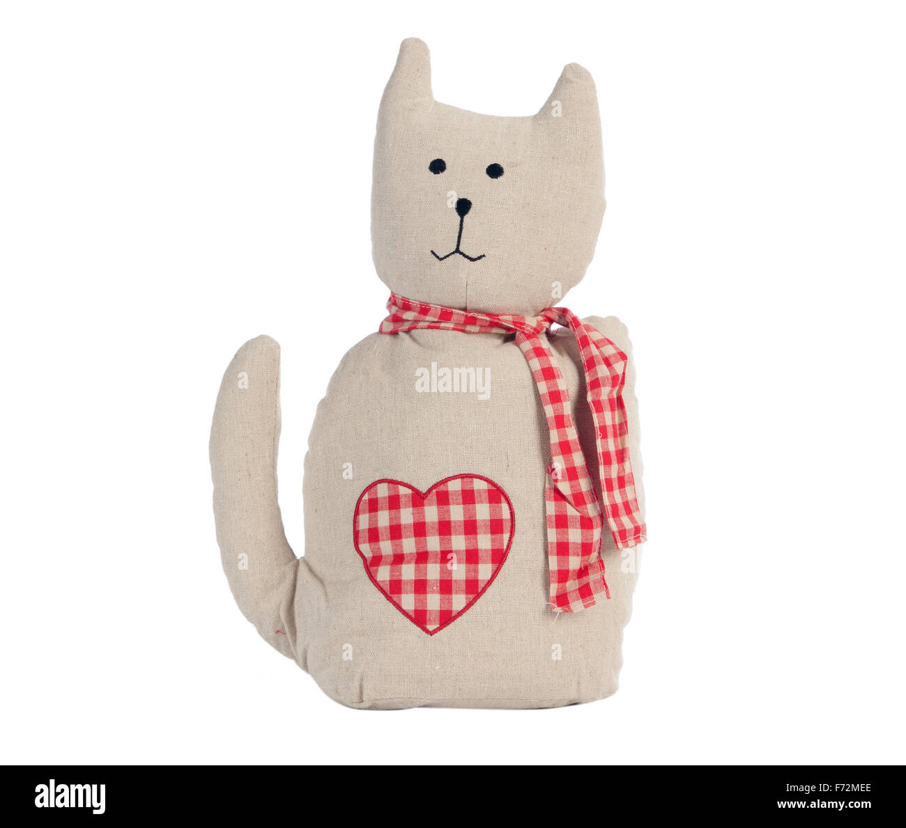 Gracioso gato juguete artesanal aislado en blanco, tela de patrón Foto de stock