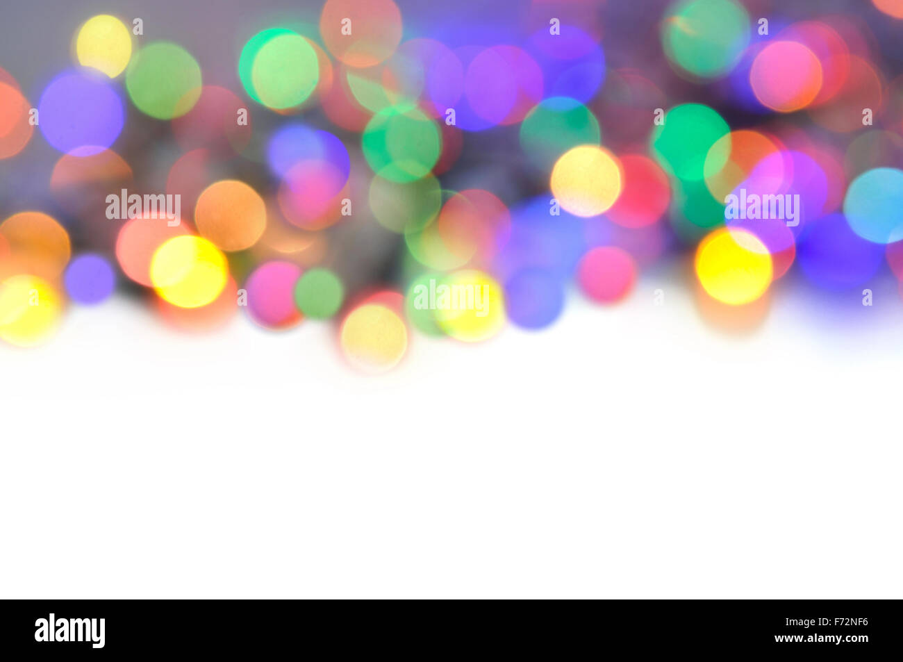 Resumen de luces multicolores con espacio en blanco Foto de stock