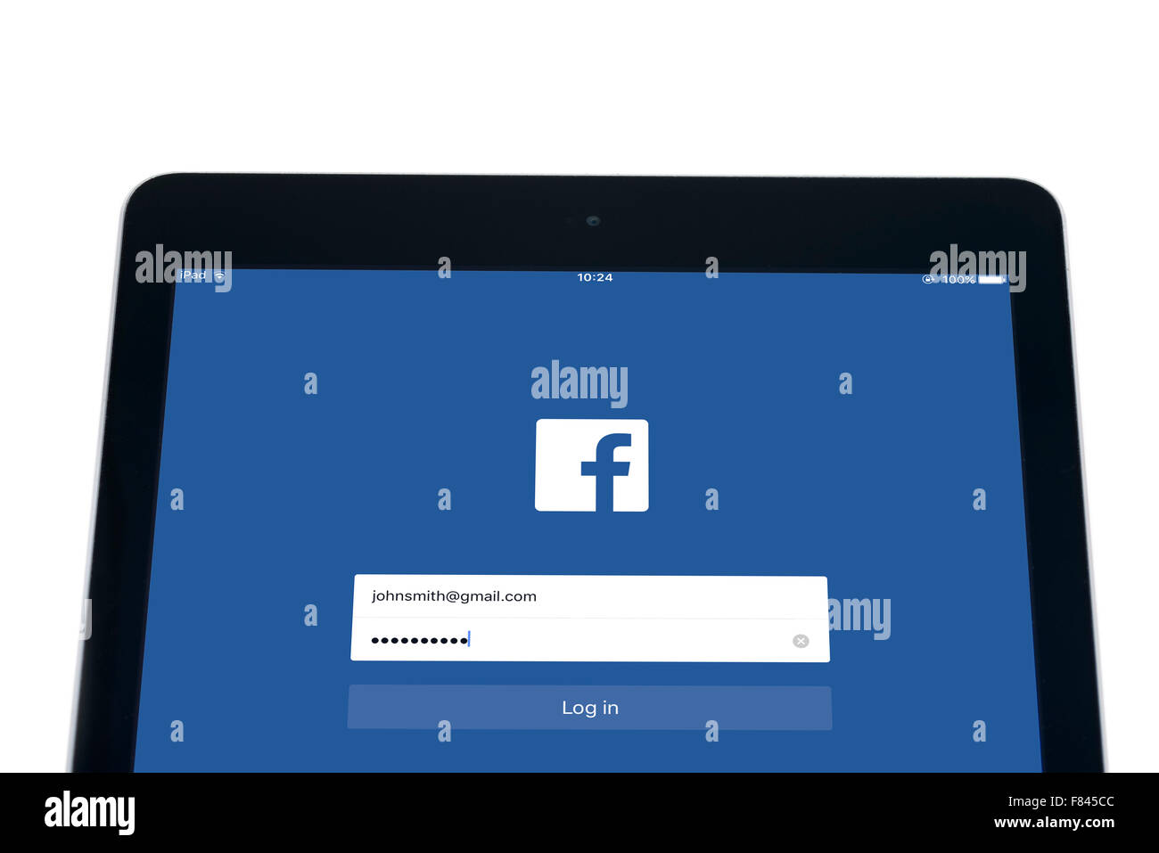 Registro en la página de la aplicación de Facebook, visto en un iPad Air Foto de stock
