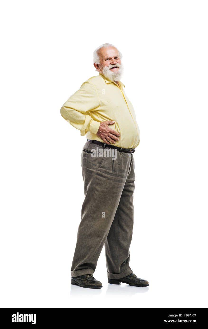Viejo hombre barbado celebración barriga aislado sobre fondo blanco. Foto de stock