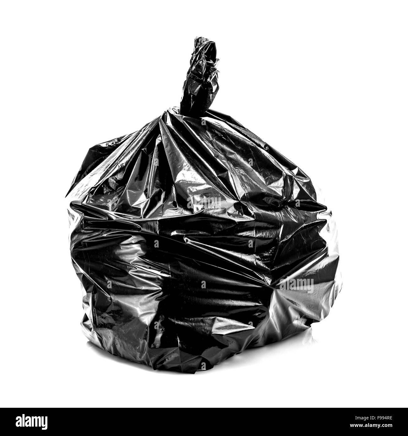 Bolsa de basura, negro sobre fondo blanco. Foto de stock
