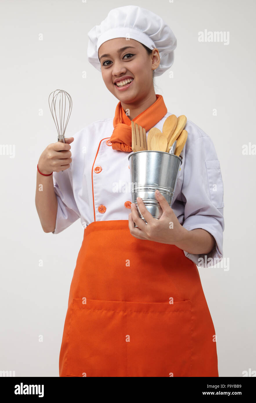 Retrato de una mujer india con el chef mantiene uniforme bata y espátula  Fotografía de stock - Alamy