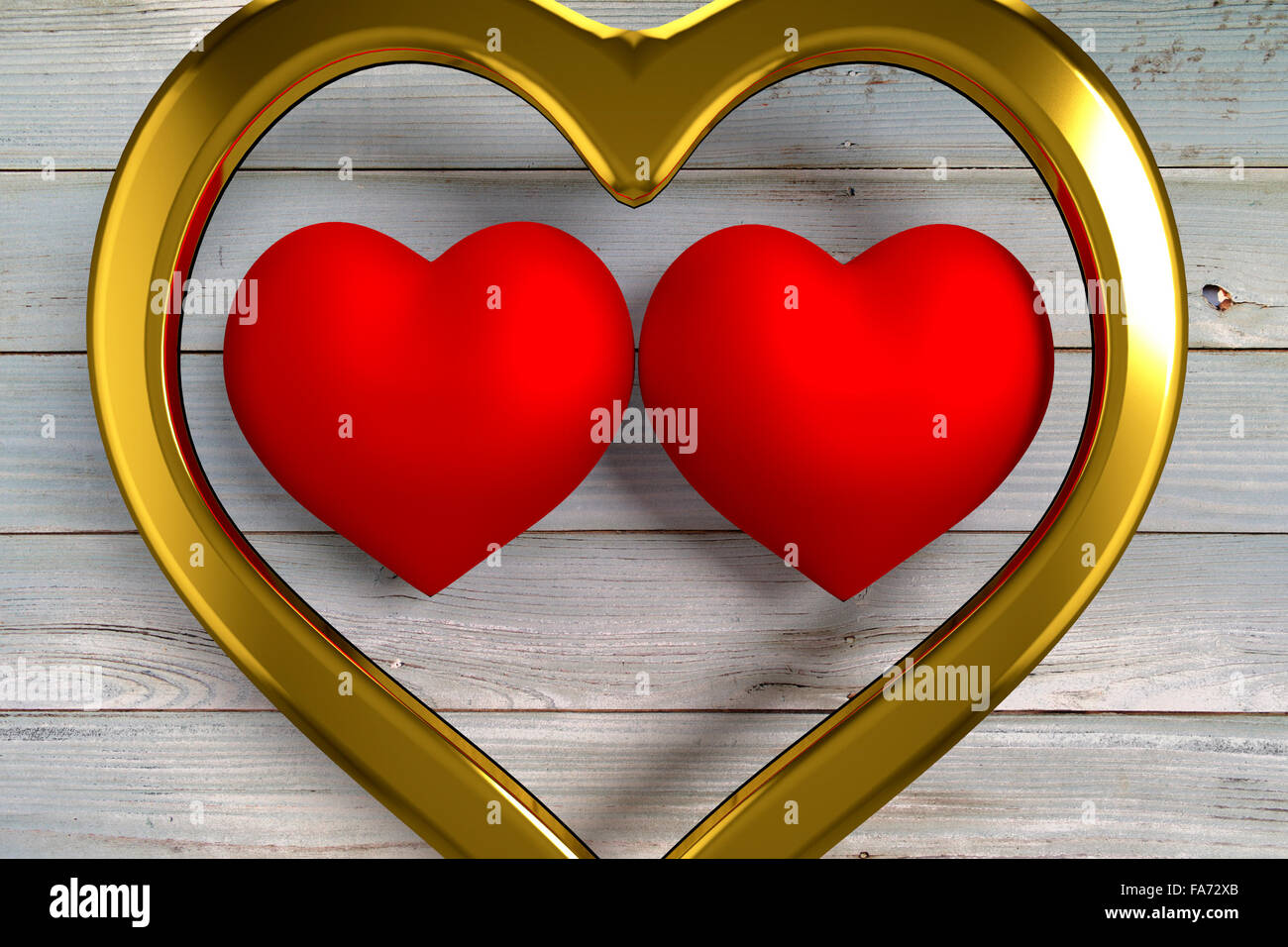 Dos corazones rojos dentro del gran corazón de oro Fotografía de stock -  Alamy