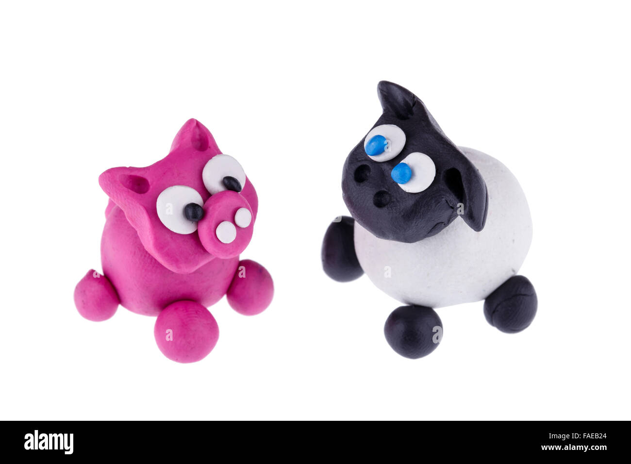 Cerdo y oveja de plastilina fotografías e imágenes de alta resolución