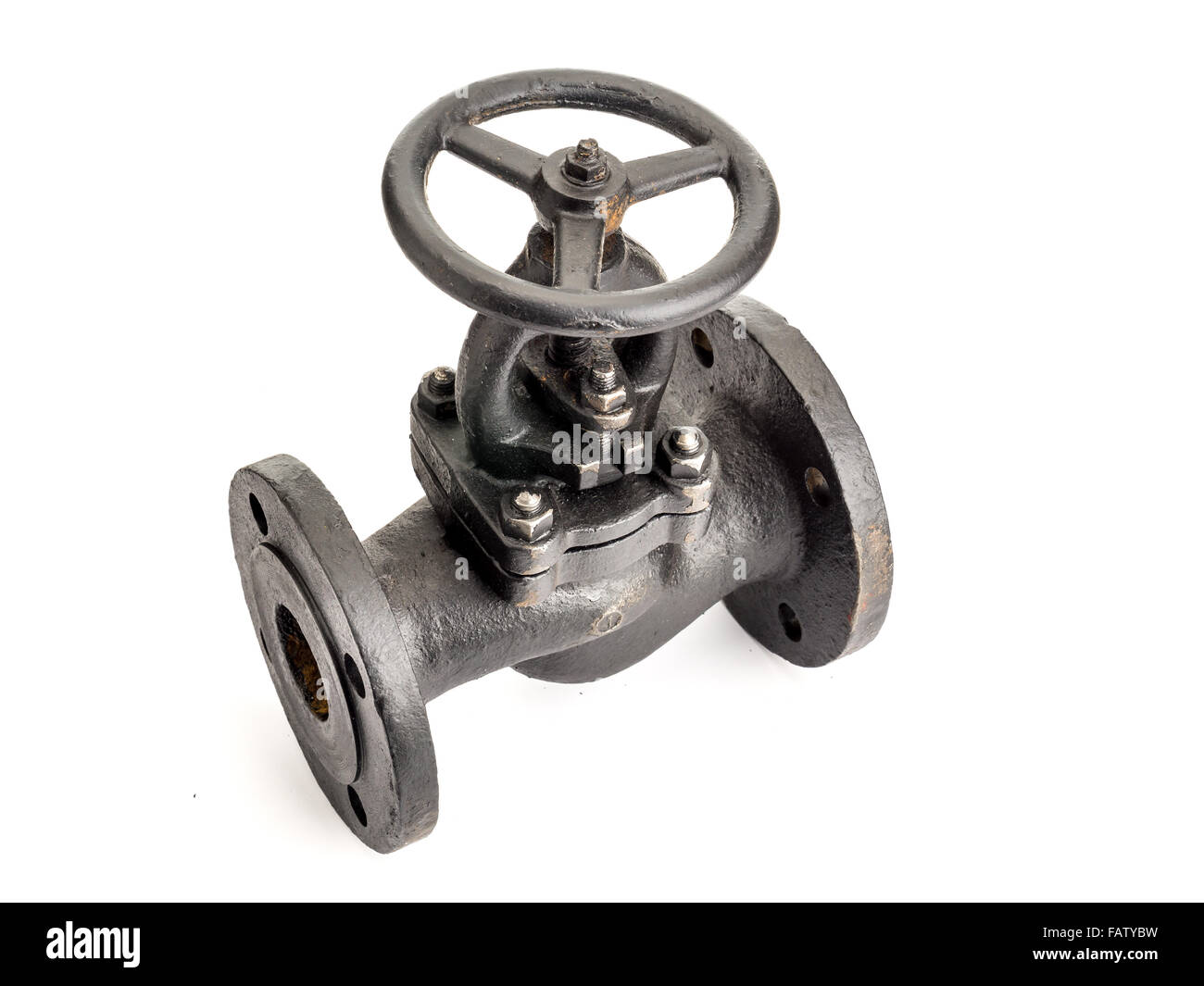 La válvula de hierro fundido de gas antiguos rodada en blanco Foto de stock