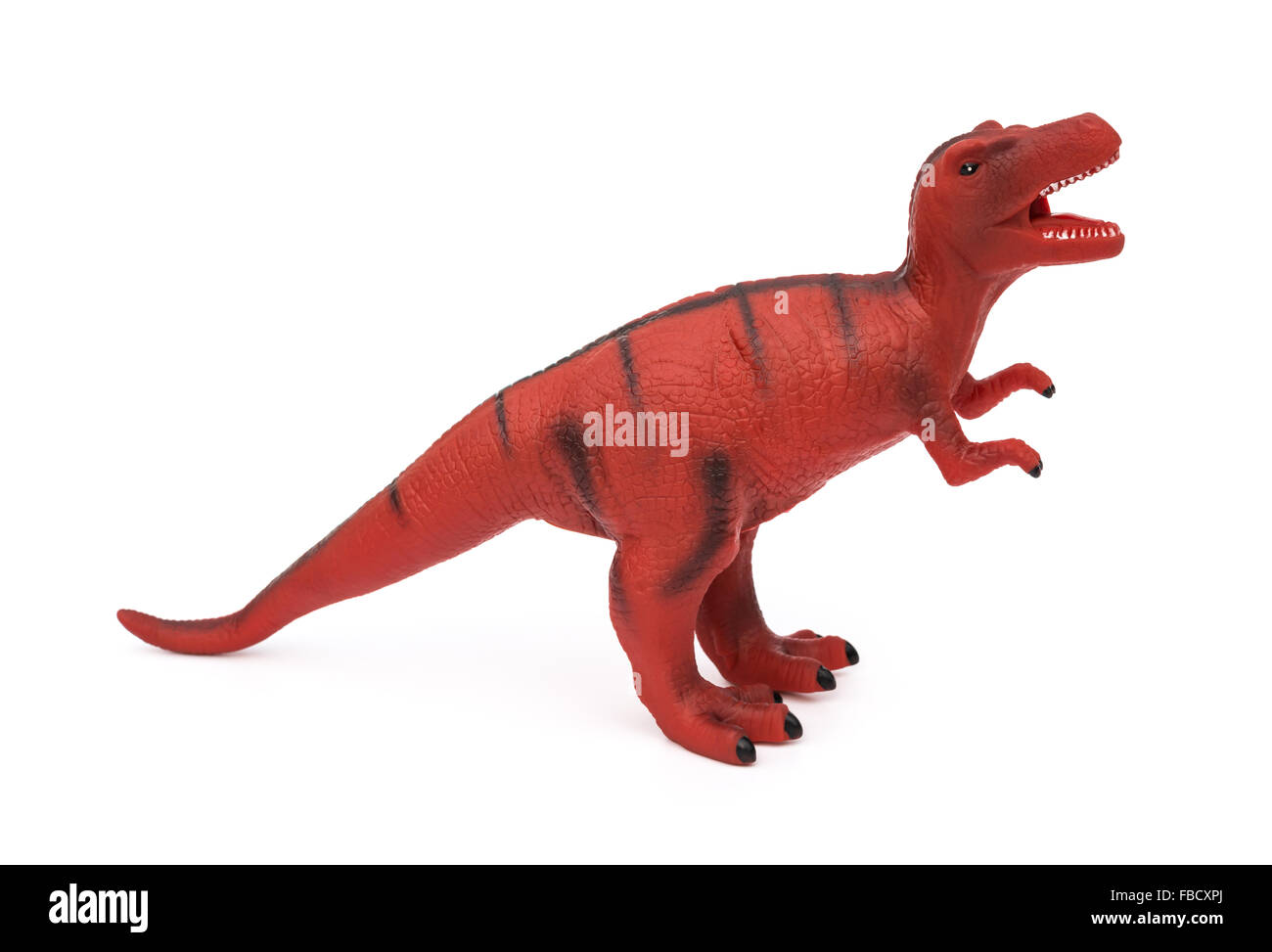 Tyrannosaurus juguete rojo sobre un fondo blanco Fotografía de stock - Alamy