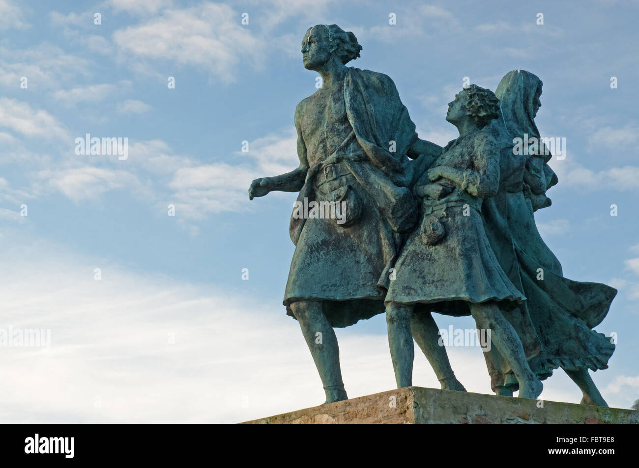 Los emigrantes estatua en Helmsdale Foto de stock