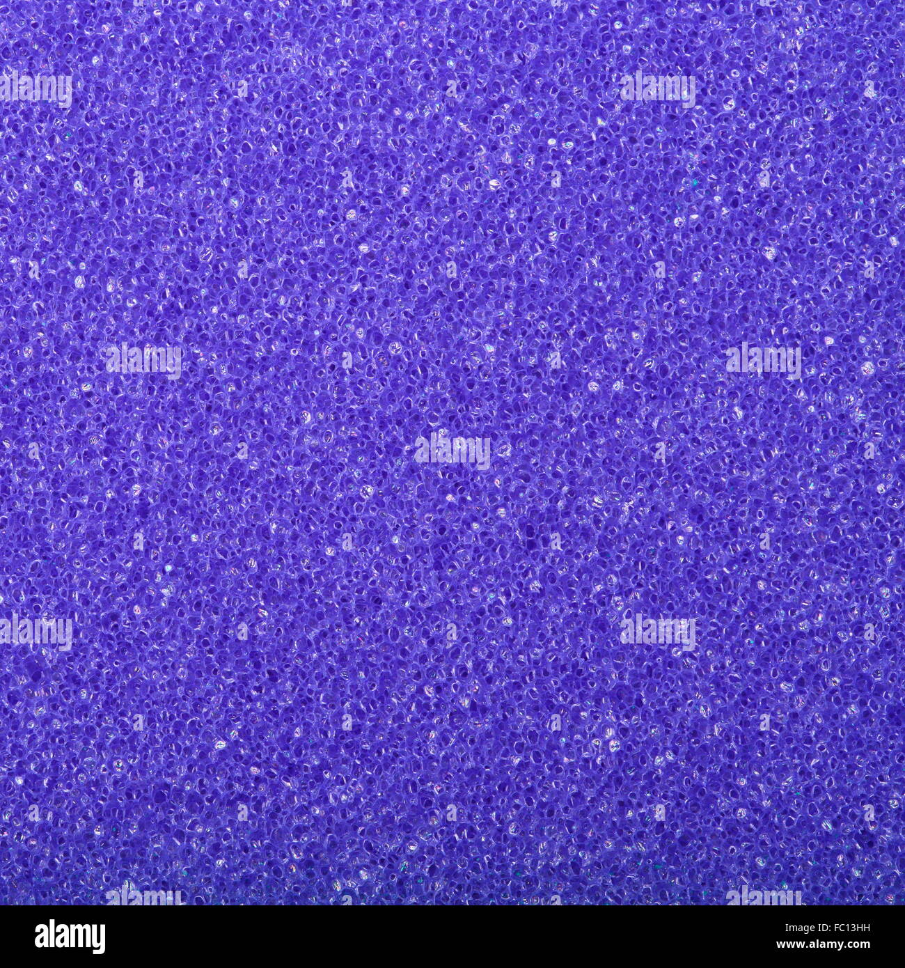 Esponja de espuma de celulosa textura violeta antecedentes Foto de stock
