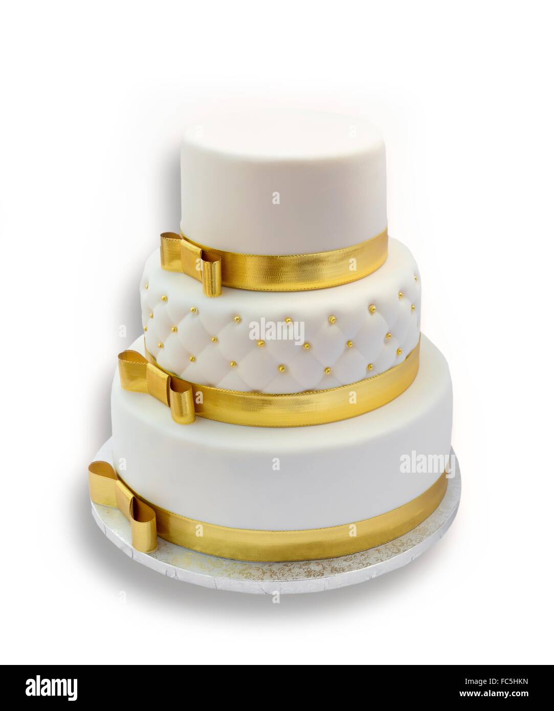 Pastel de bodas de oro Imágenes recortadas de stock - Alamy