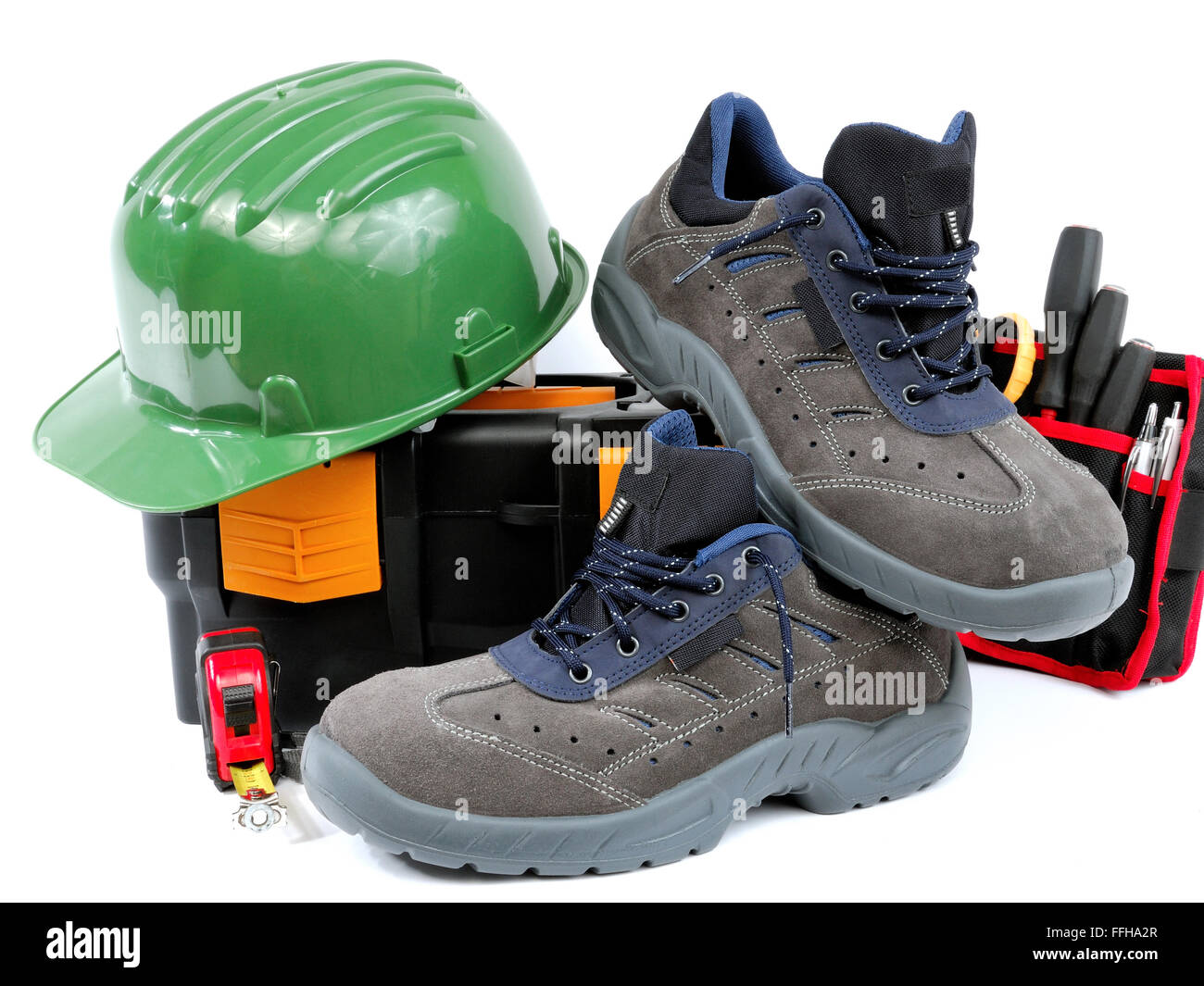 Zapatos para trabajo pesado en el sitio de construcción Fotografía de stock  - Alamy