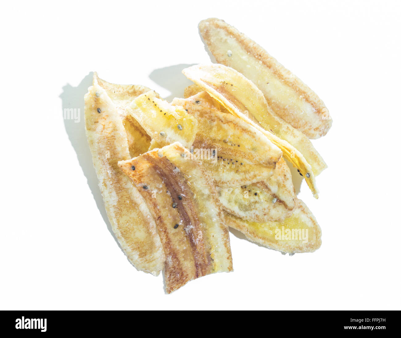 Rodajas de plátano secadas recubierto con azúcar, aislado Foto de stock