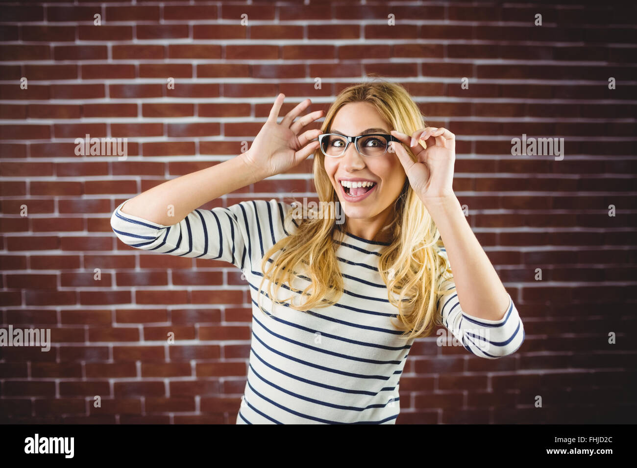 Mujer rubia con gafas fotograf as e im genes de alta resoluci n