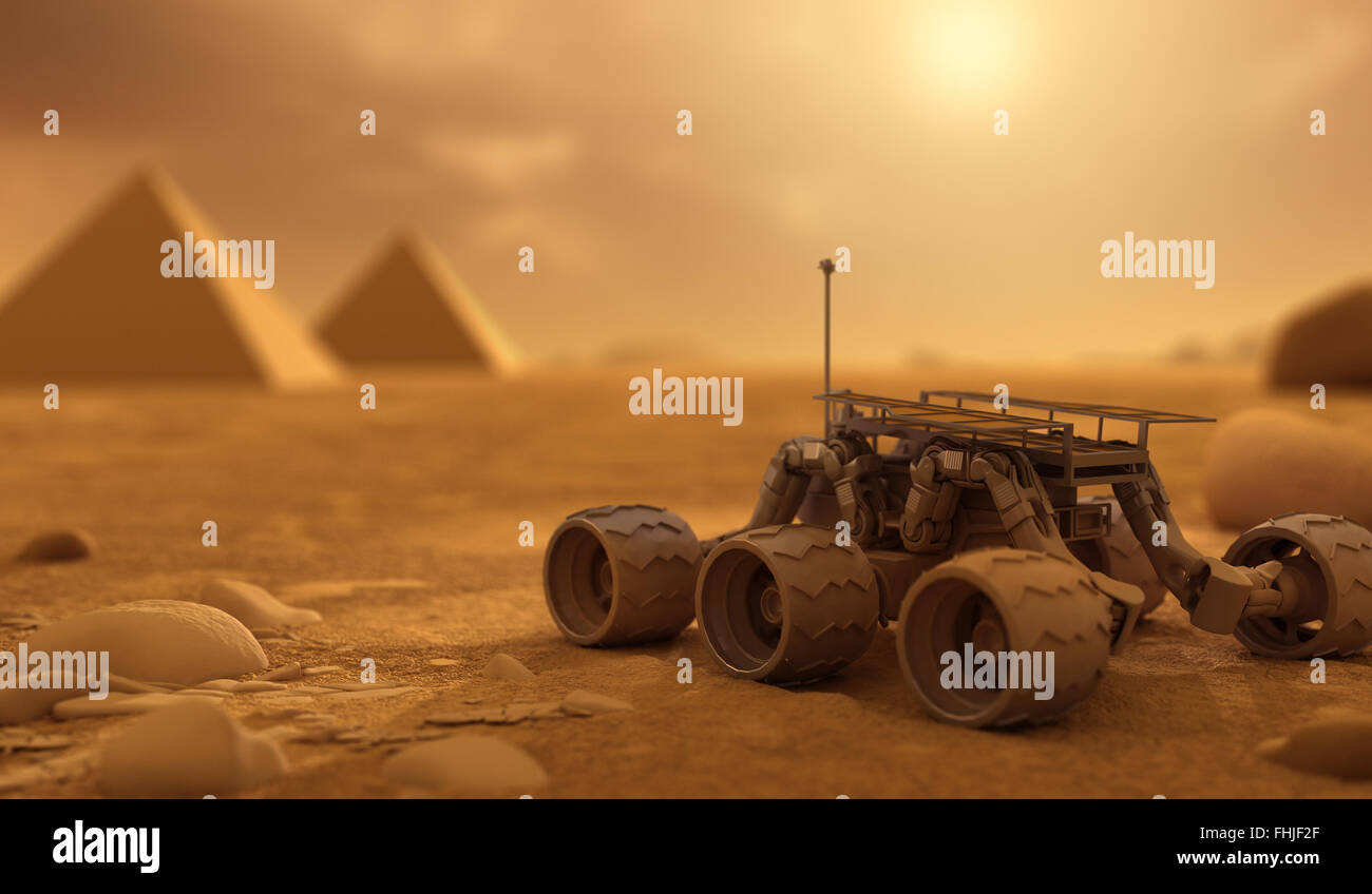Rover y pirámides en Marte Foto de stock