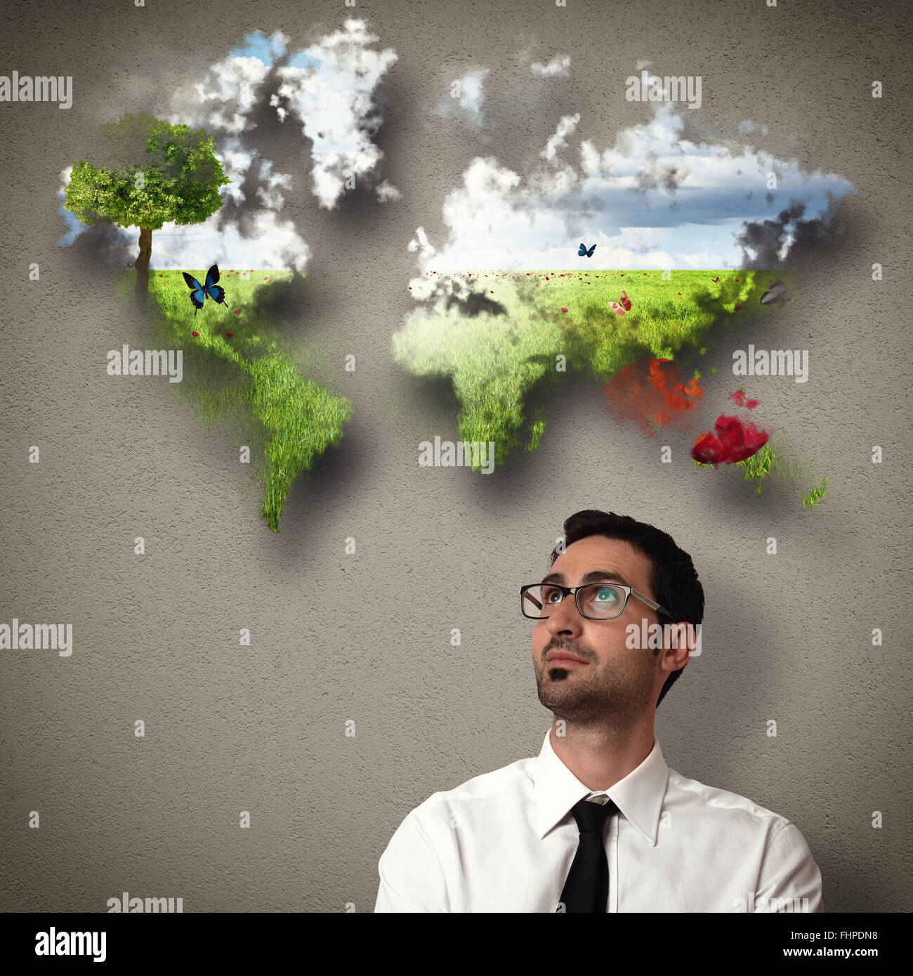El empresario se imagina un mundo limpio Foto de stock