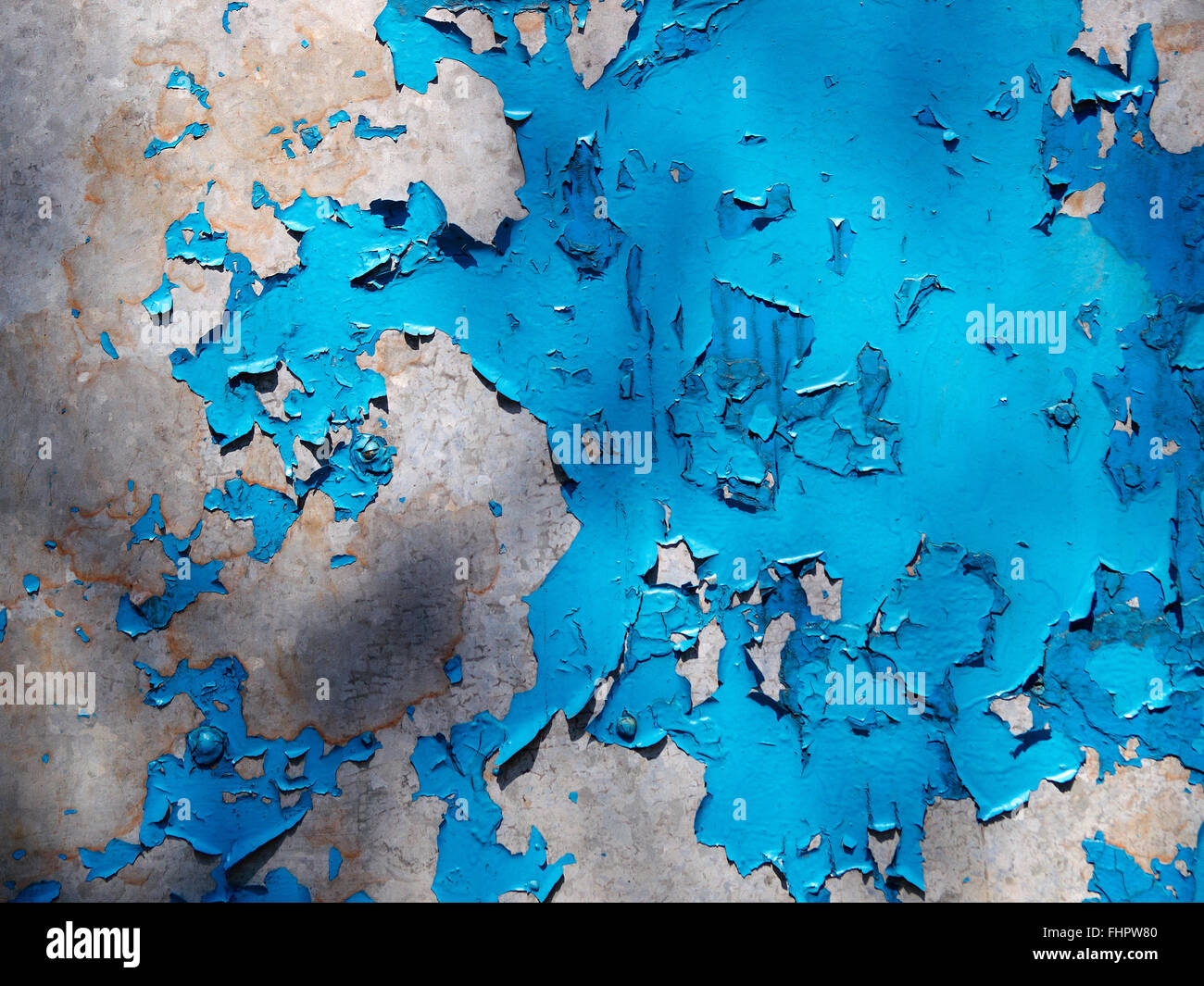 Restos de pintura azul copos en viejas superficies metálicas Fotografía de  stock - Alamy