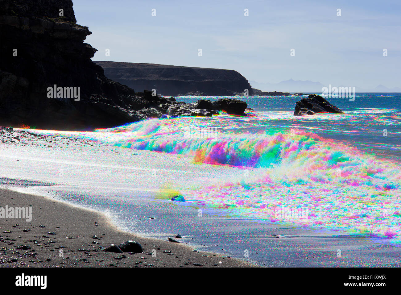 Fotografía de combinación de tres imágenes de colores separados de las olas rompiendo en la playa de Ajuy, Fuerteventura, Islas Canarias, España Foto de stock